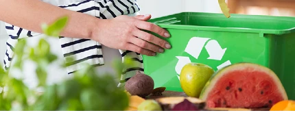 Person getting compost pile together