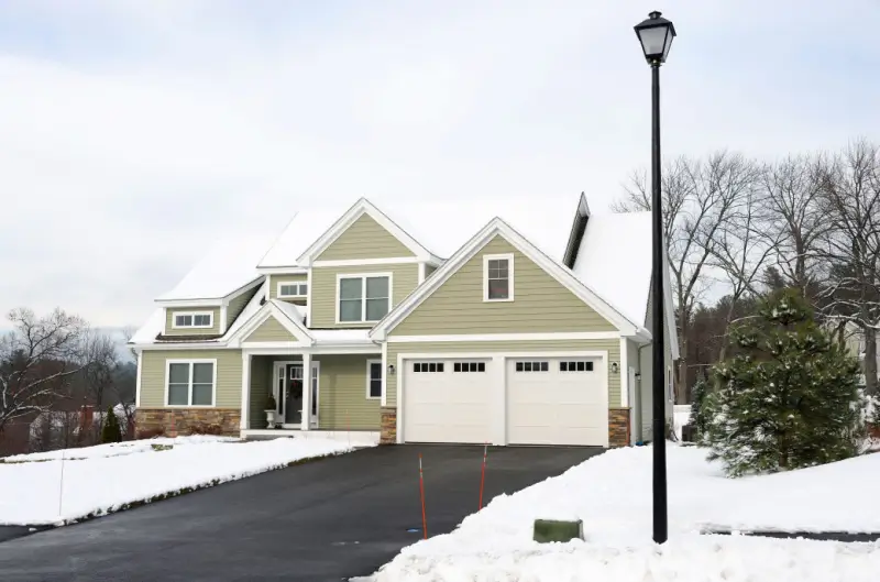 Home with heated snow mats under driveway