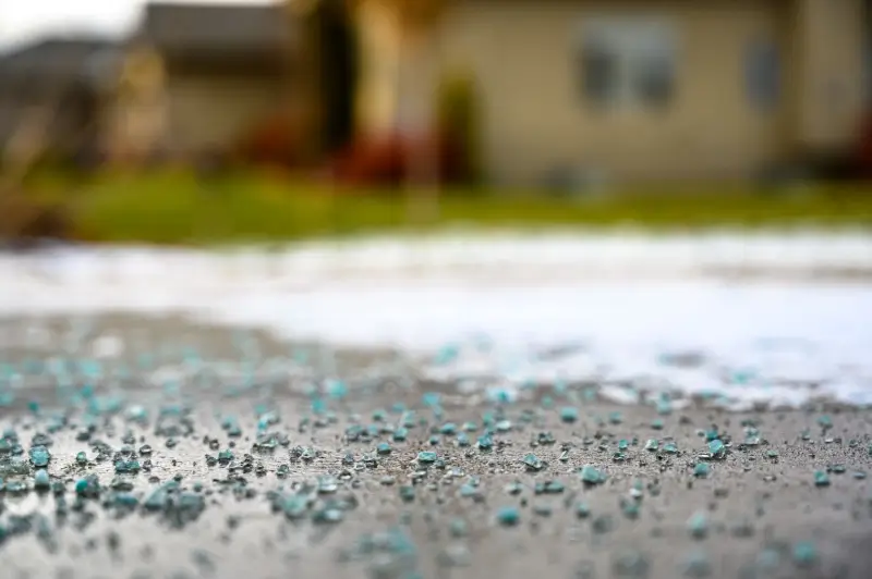 Salt ice melt on a pathway.