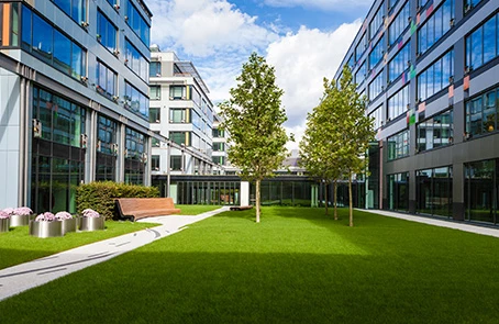 Business park exterior with manicured lawn.